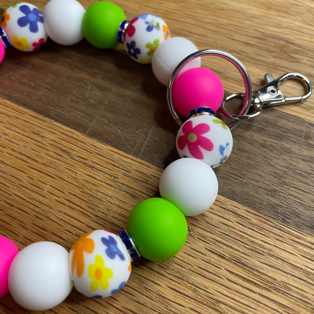 Colorful floral print, lime green, hot pink and white silicone bead wristlet keychain